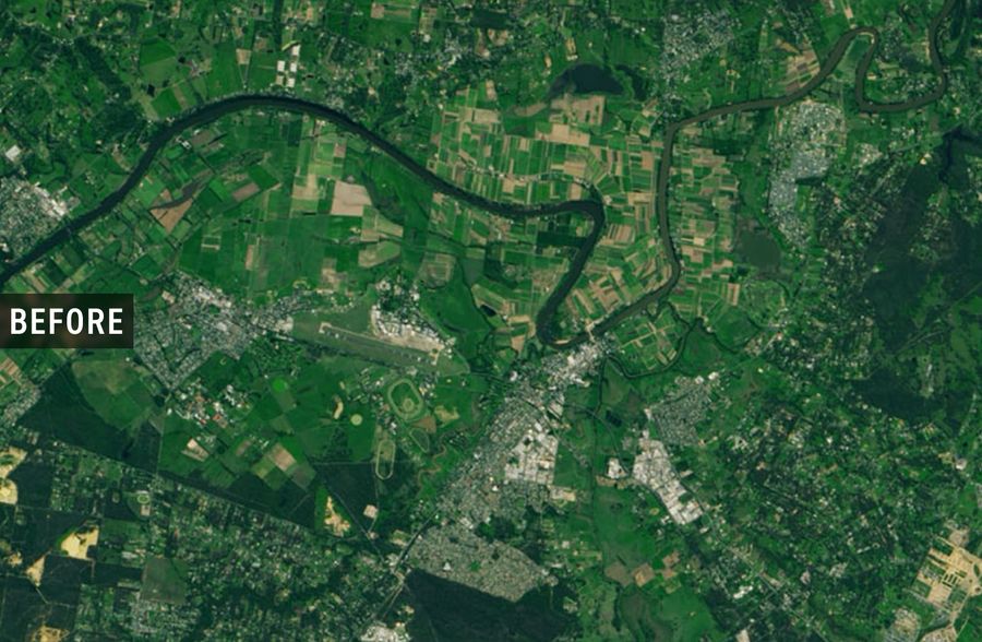 Normal river levels with healthy vegetation along banks